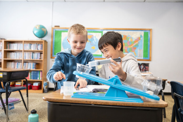 Elementary students working on a science experiment at Salem Lutheran School in Greenfield, MN